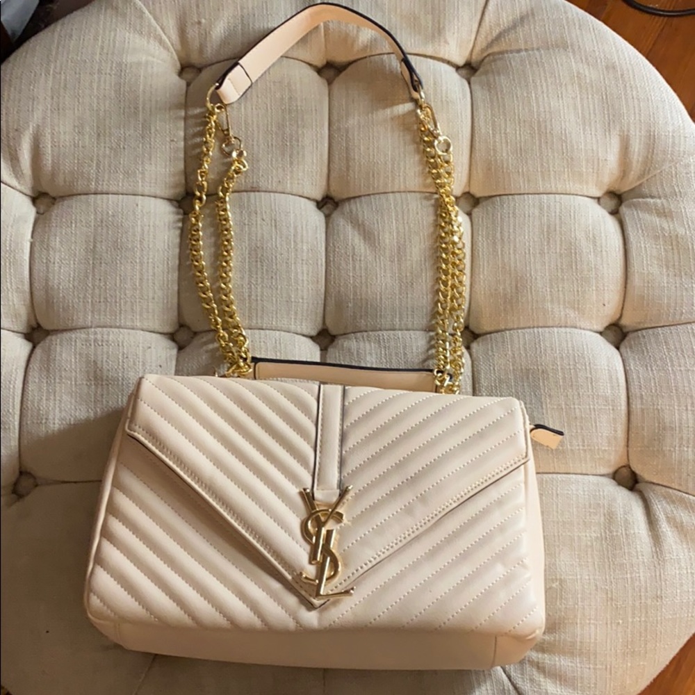 Quilted shoulder bag YSL. Looks real.
